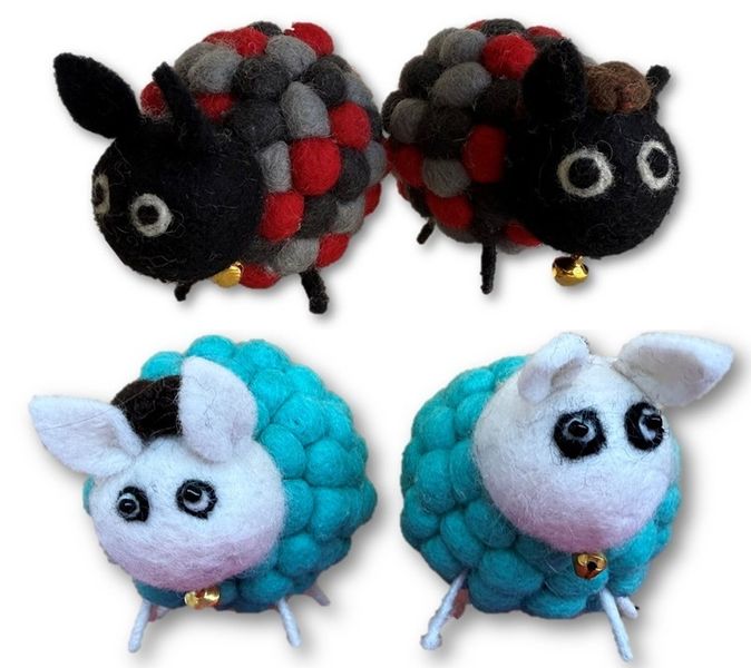 Morsom sau laget av filtkuler